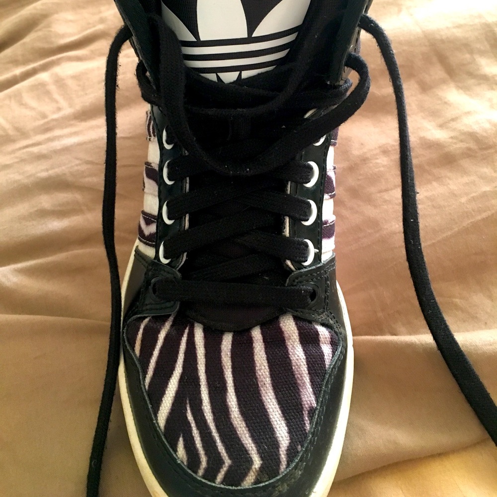 Adidas women’s high tops size 7. Worn twice